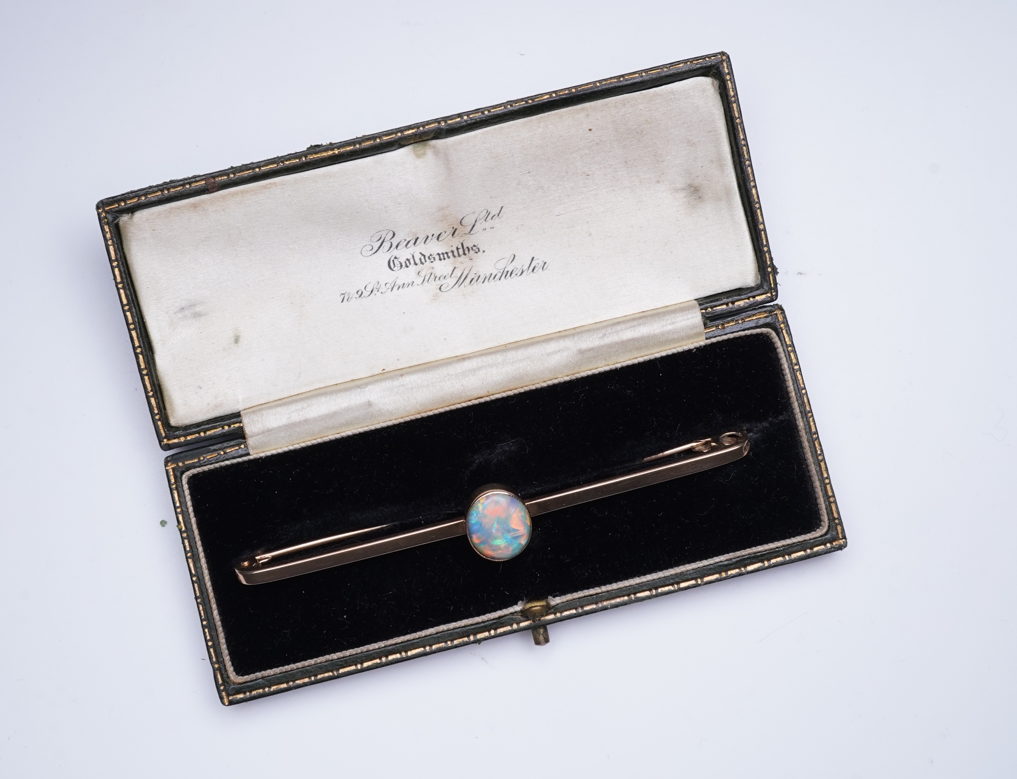 An Edwardian gold and opal brooch, early 20th century